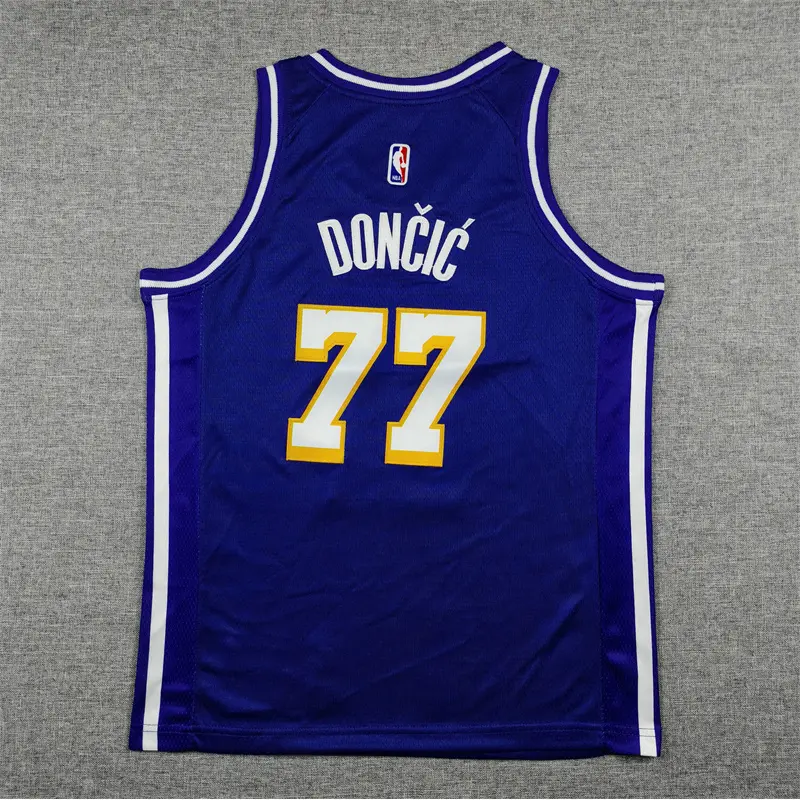 Camiseta Luka Dončić #77 Los Angeles Lakers 2026 Morado Statement Edition Niño